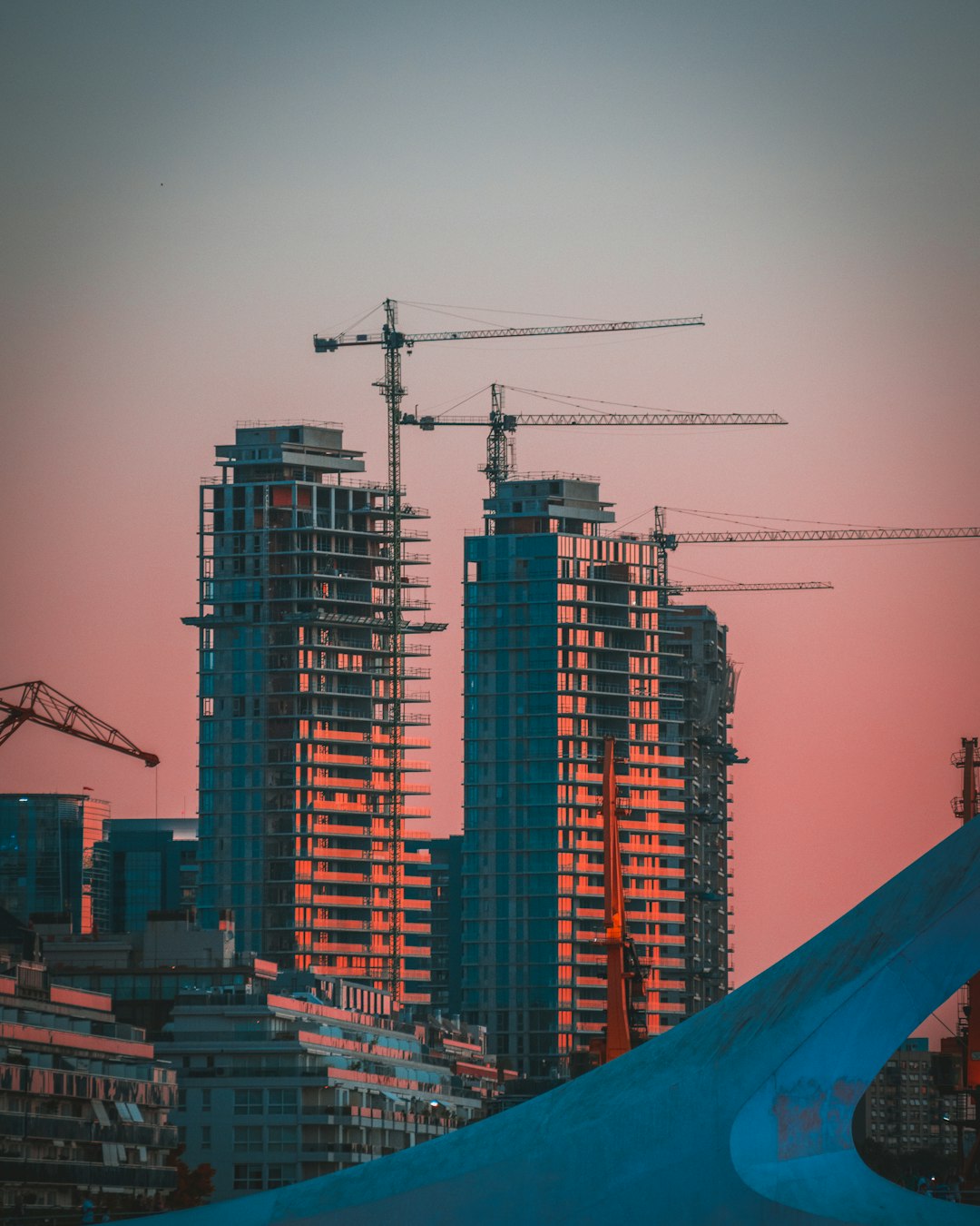 why-choose-us-01 gray-building-crane-photo-during-sunset-2ykxqikhnfk